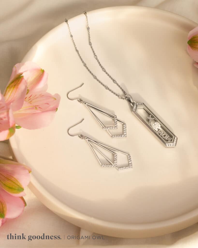 Silver vertical Living Locket with baguette crystals and silver geometric earrings with crystals from spring collection 
