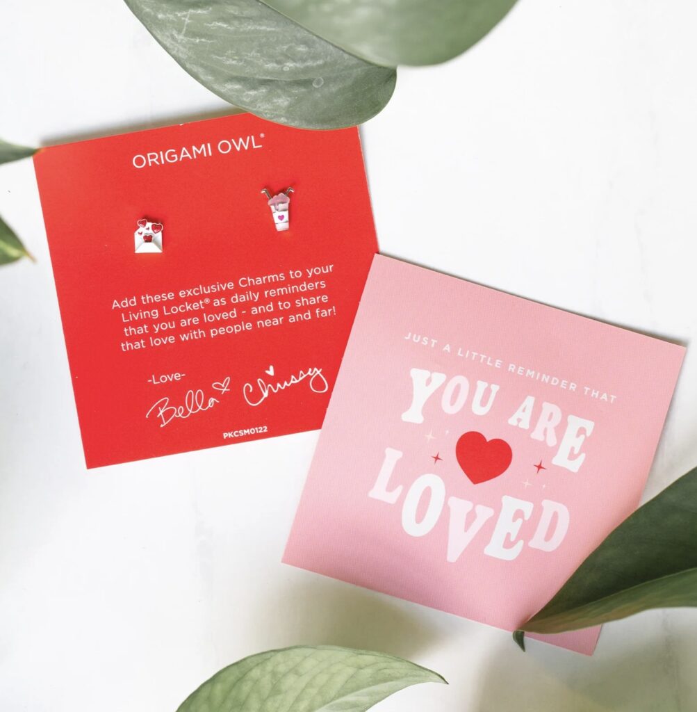 origami owl valentines charms for collectors club, a white envelope with hearts and a white soda with 2 straws