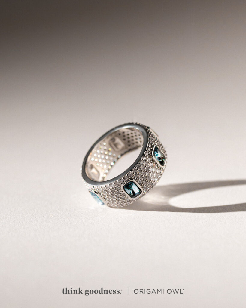 A silver pave Montana blue crystal ring which is a part of the origami owl summer jewelry collection 
