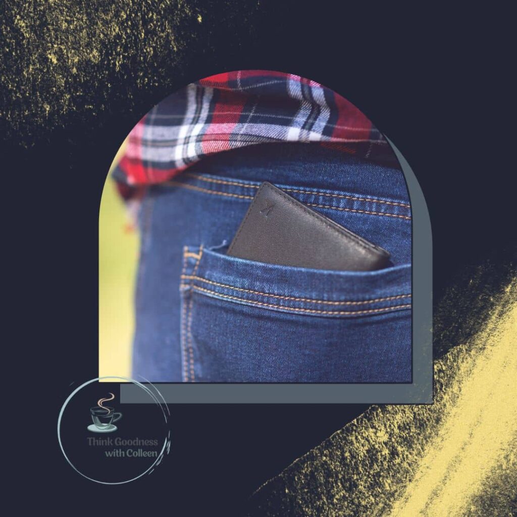 A dark blue and gold image with a picture of jeans back pocket with wallet