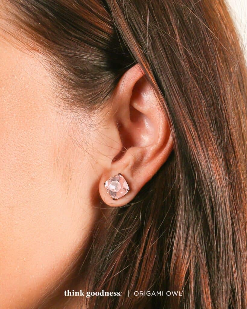 an image of the side of a woman's face showing her wearing the vintage rose clara stud earrings for fall season 2023