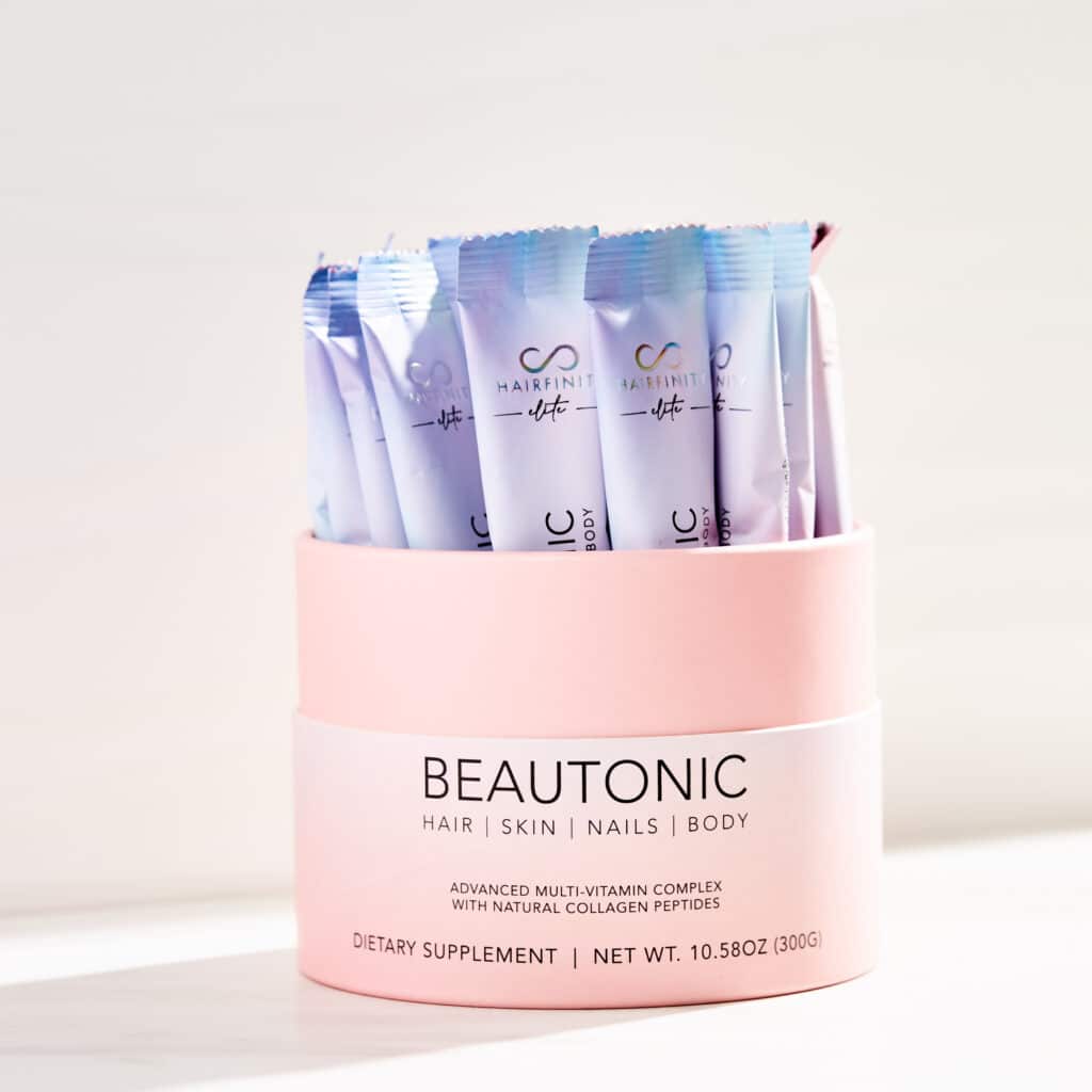a light image of a container of Hairfinity Elite Beautonic with the cover off showing the sachets of Beautonic