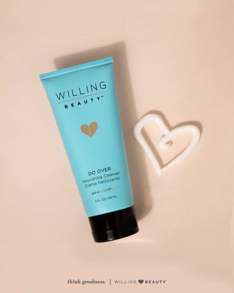 A beige image with a blue tube of willing beauty do over nourishing cleanser with a white heart next to the tube