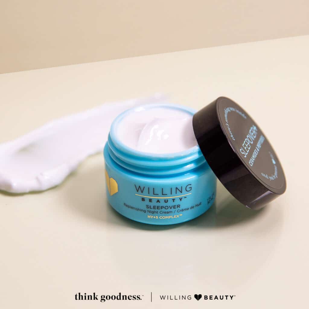 A beige image of willing beauty sleepover night cream with the cover on the side of the jar
