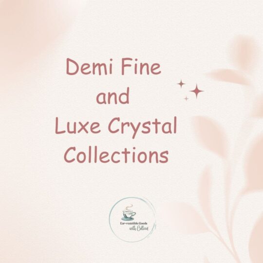 A light pink background with images of leaves in light pink with the words Demi fine and luxe crystal collections