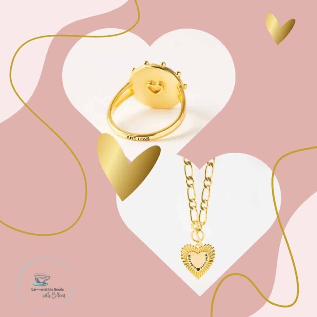 a light pink image with white on 2 sides and gold lines. two hearts in the middle have the back of the gold products to show you the inscription the necklace says 'keep your heart open' and the ring says 'just love'